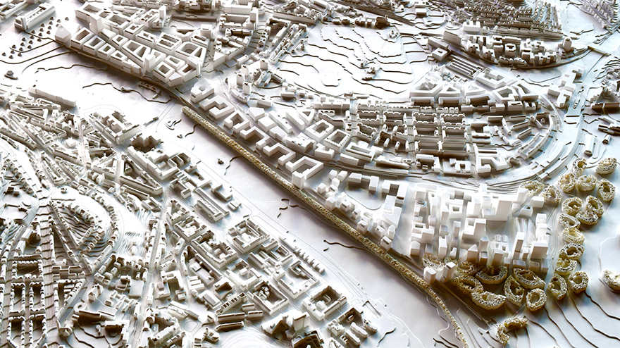 Der zweitplatzierte Entwurf sieht in einem Quartier nahe des Rosensteinparks eine Hochhausbebauung und Baumhaine (rechts unten) als neues Freiraumelement vor. Außerdem ist auch der Übergang beim Gleisbogen im Vergleich zum Erstplatzierten anders gestaltet und die "Kante" zum Schlossgarten etwas schärfer gewählt. Der Übergang vom Europaviertel (links oben) zum Schlossgarten überzeugt vor allem durch die vielen Querungsmöglich­keiten. Fotos: FotoFuchs/Stadt Stuttgart
